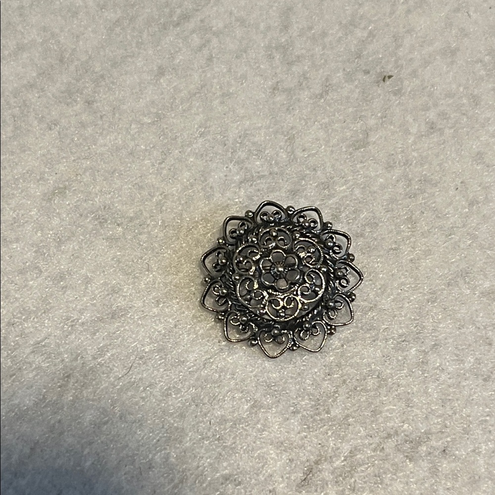 Elegant Silver Floral Brooch
